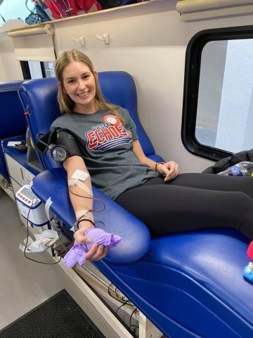 Avenlea White donates blood during the pandemic.