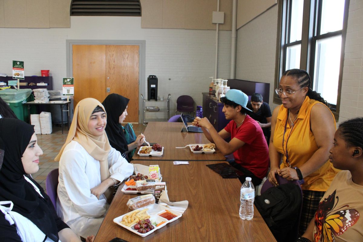 Karen Brown, right, leads the Friendly Faces Table.