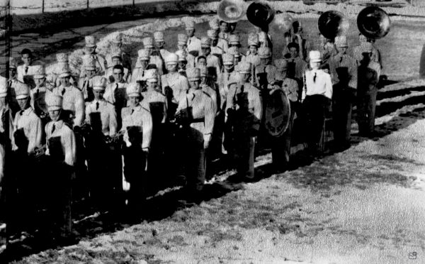 Leslie Arnold stands in line for the 1957 O-Book band picture. 
Edited by Cris Bataillon sourced from the Central O-Book. 