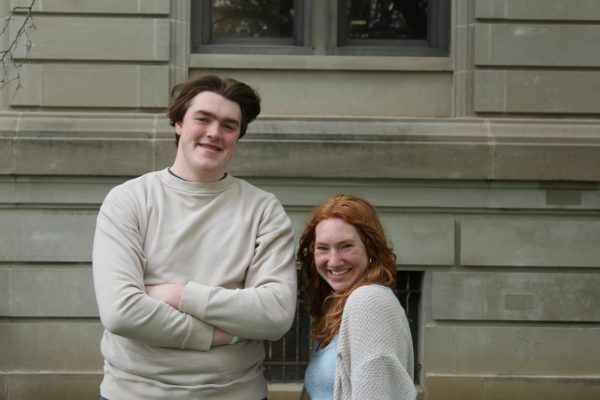 Co-editors in chief Charlie Yale and Ella Levy pose outside of Register classroom