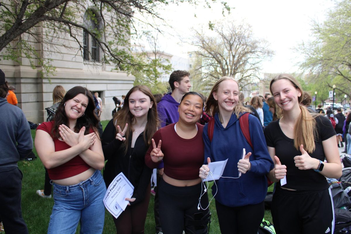 Seniors+pose+with+the+eagle+symbol+on+April+23.