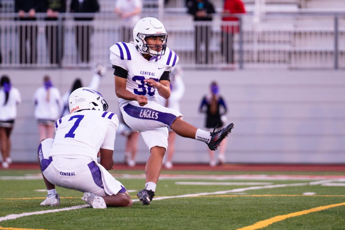 Junior Robin Vargas-Pablo leads through a field goal kick versus Omaha South