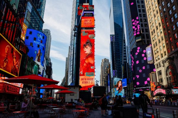 A billboard advertises "The Official Release Party of a Showgirl," a movie celebrating Taylor Swift's new album "The Life of a Showgirl," in Times Square, New York City, U.S., October 3, 2025. REUTERS/Kylie Cooper