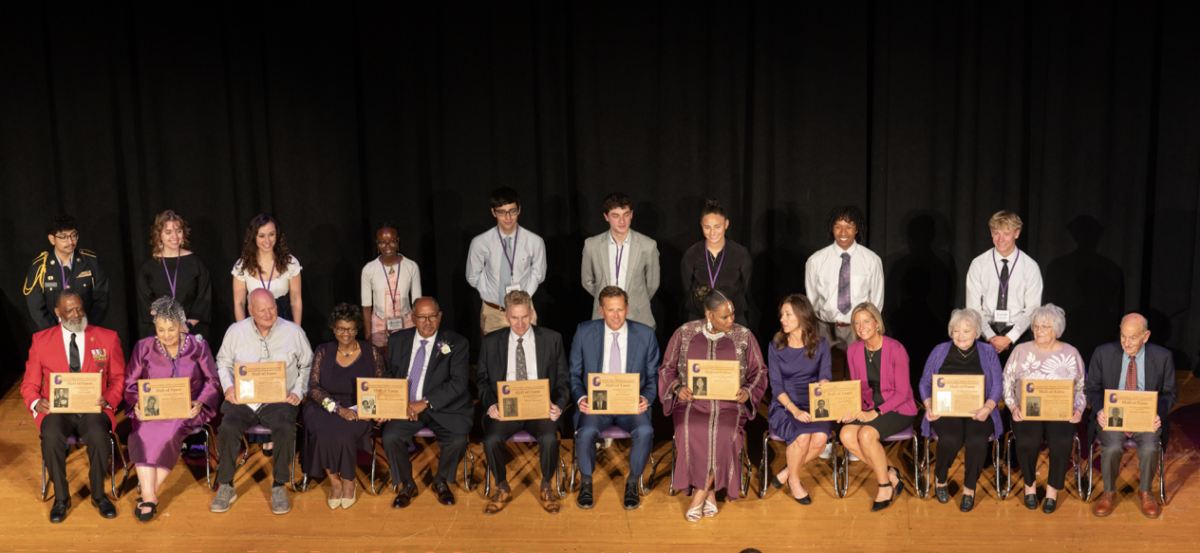 25th Hall of Fame class standing with National Honor Society members post induction