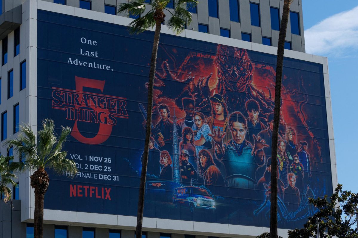 The Netflix logo and an advertisement for "Stranger Things" are shown on one of their buildings in the Hollywood neighborhood of Los Angeles, California, U.S., December 2, 2025. REUTERS/Mike Blake