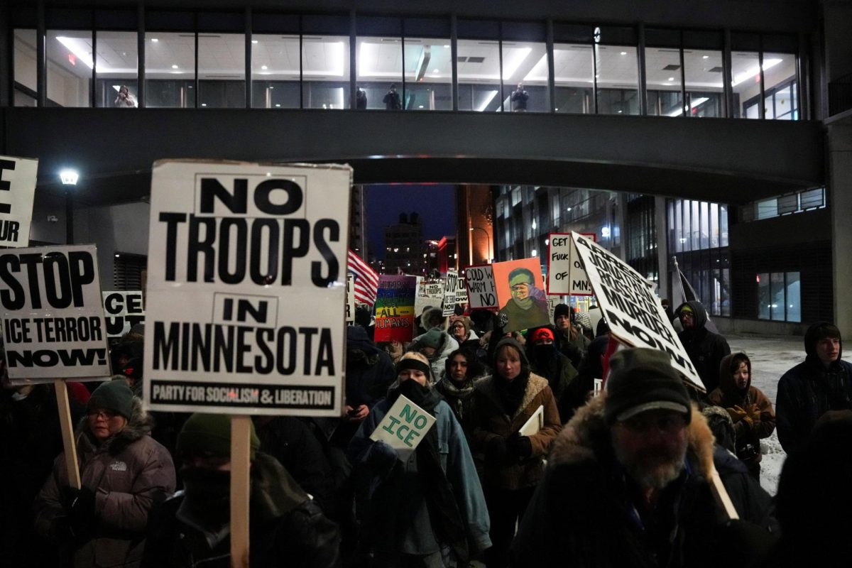 People march through downtown Minneapolis during a "Stop ICE Terror" protest after a U.S. Immigration and Customs Enforcement (ICE) agent fatally shot Renee Nicole Good on January 7 during an immigration raid, in Minneapolis, Minnesota, U.S., January 20, 2026. REUTERS/Leah Millis
