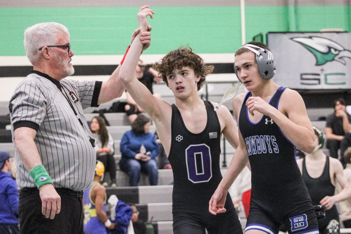 Sophomore Isaiah Tuttle wins his wrestling match