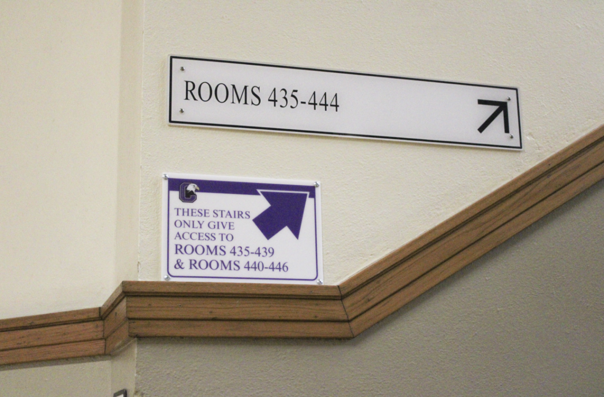 Signs on the 3rd floor 4 side at the bottom of the stairs in Central High School on Jan. 16.