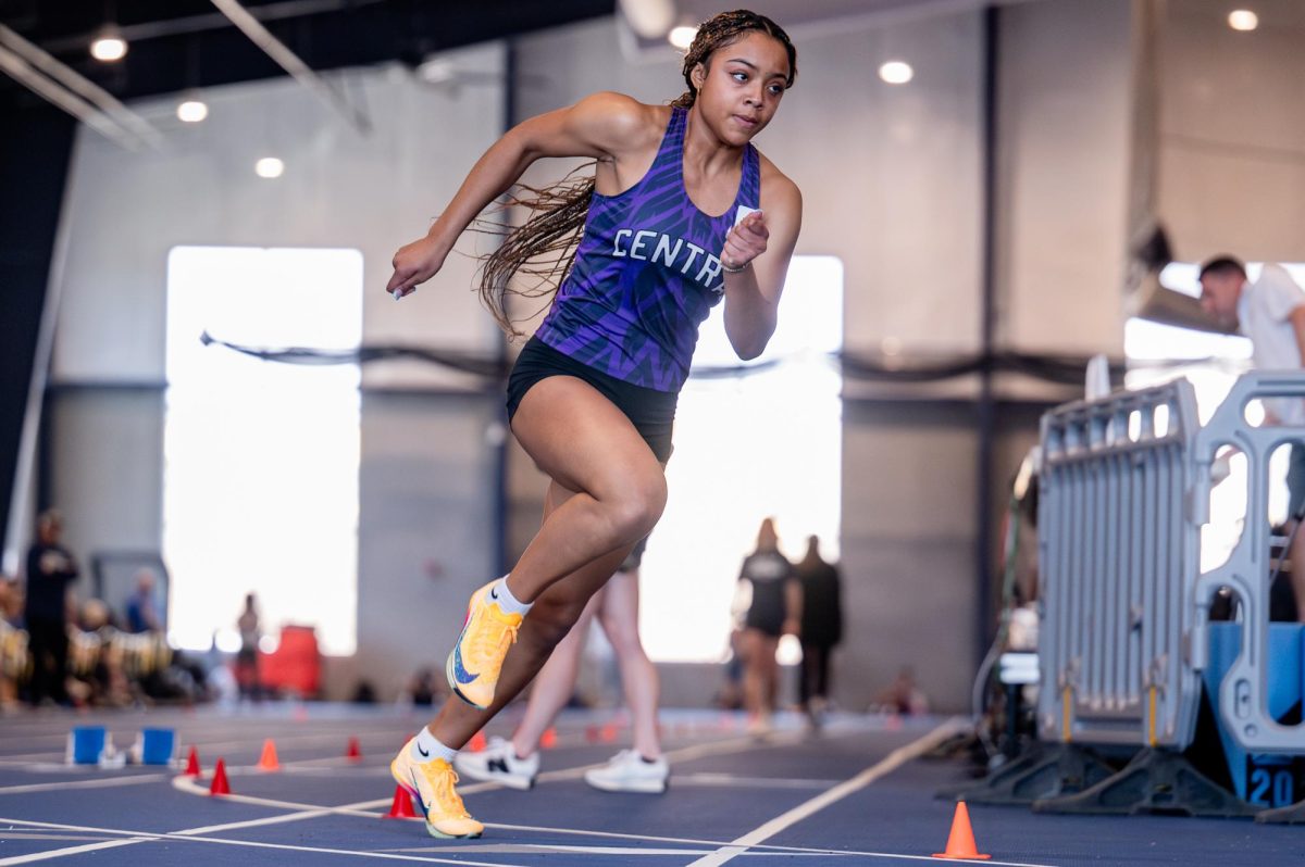 Sophomore Mariluna Reyes McGovern runs down the track at a track meet at College of Saint Mary on March 21.