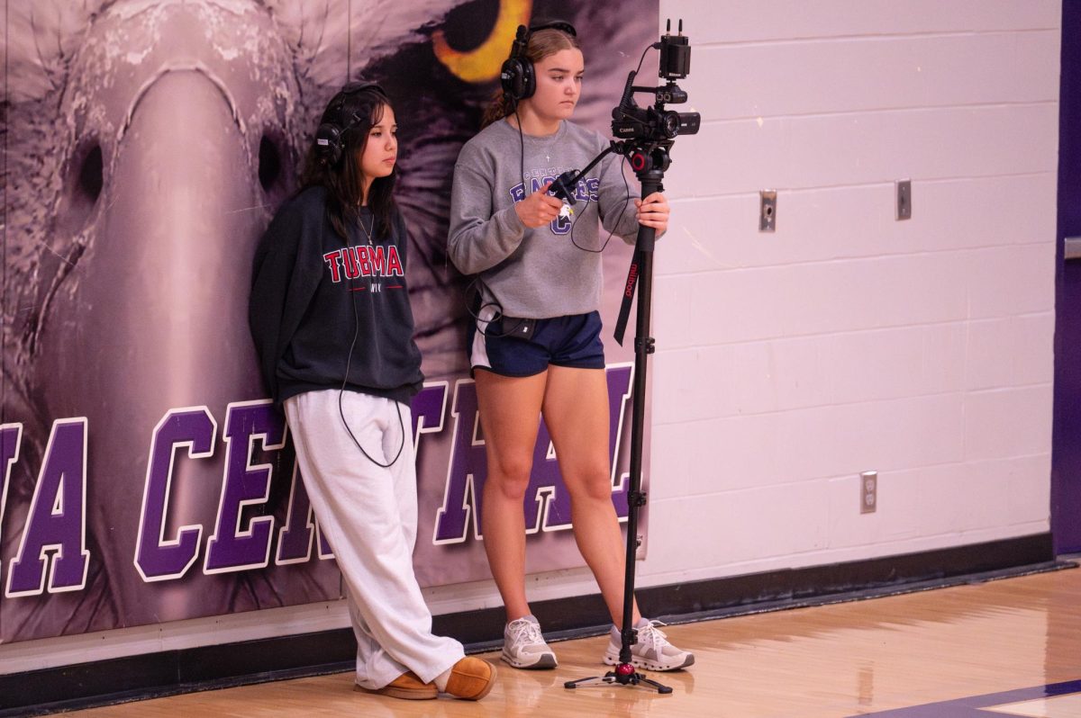 Starting from the left Sophomore Garciela Sitting Eagle, and sophomore Stella Henriquez take a photo
