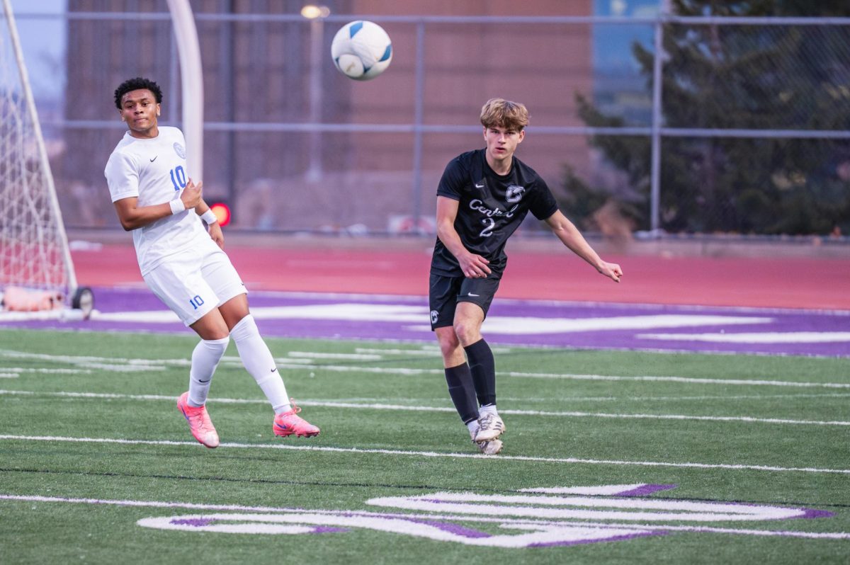 Sophomore Gustave Johnson kicks the ball during a game versus Creighton Prep on March 19